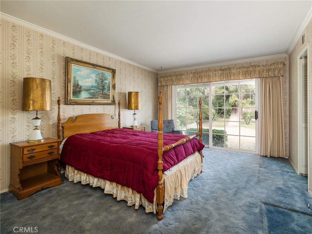 61 Ranchview Road Rolling Hills Estates, CA 90274 - Photo 20 of 44 a spacious bedroom with a bed and a large window