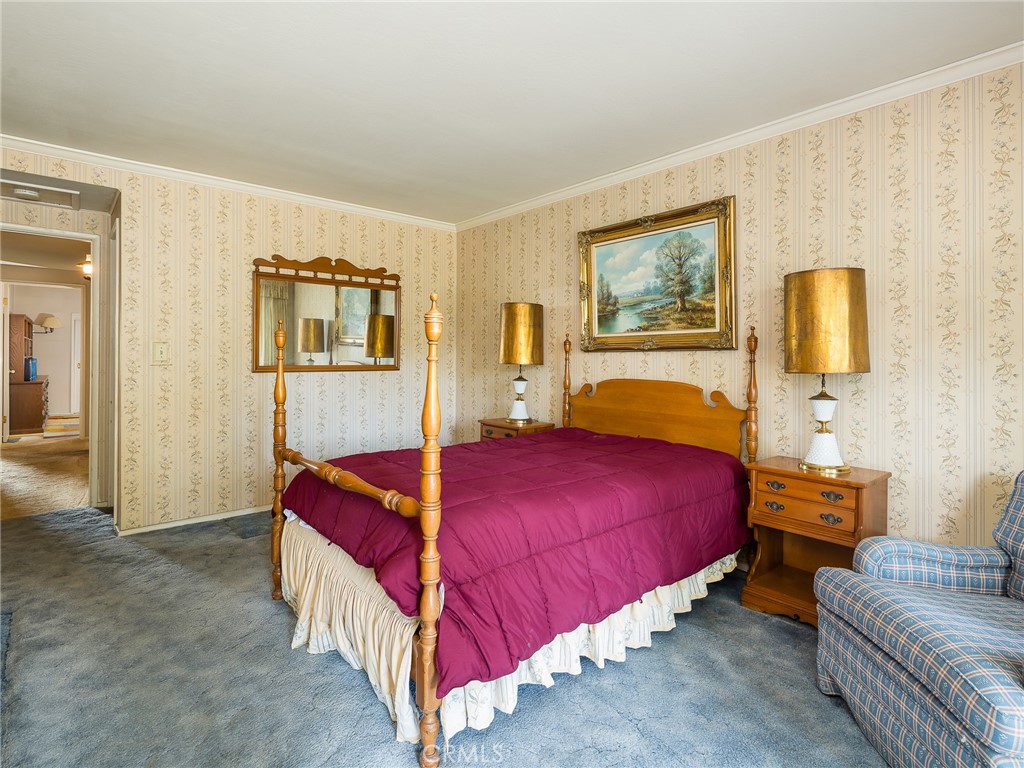 61 Ranchview Road Rolling Hills Estates, CA 90274 - Photo 21 of 44 a bedroom with bed and window