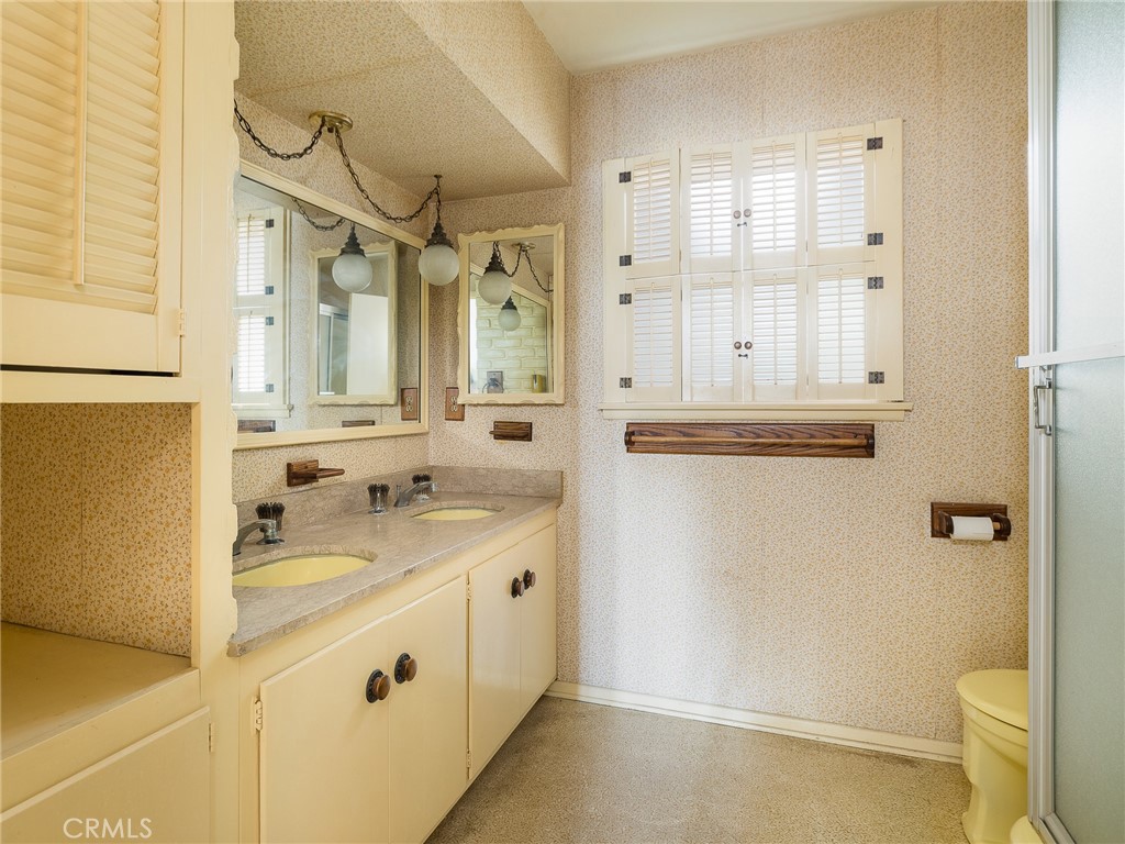 61 Ranchview Road Rolling Hills Estates, CA 90274 - Photo 24 of 44 a bathroom with a granite countertop sink toilet and shower