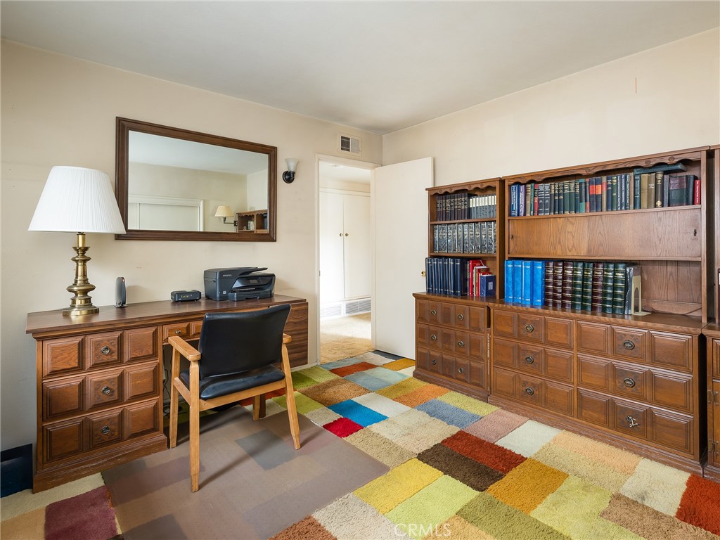 61 Ranchview Road Rolling Hills Estates, CA 90274 - Photo 27 of 44 a living room with furniture and a baby crib