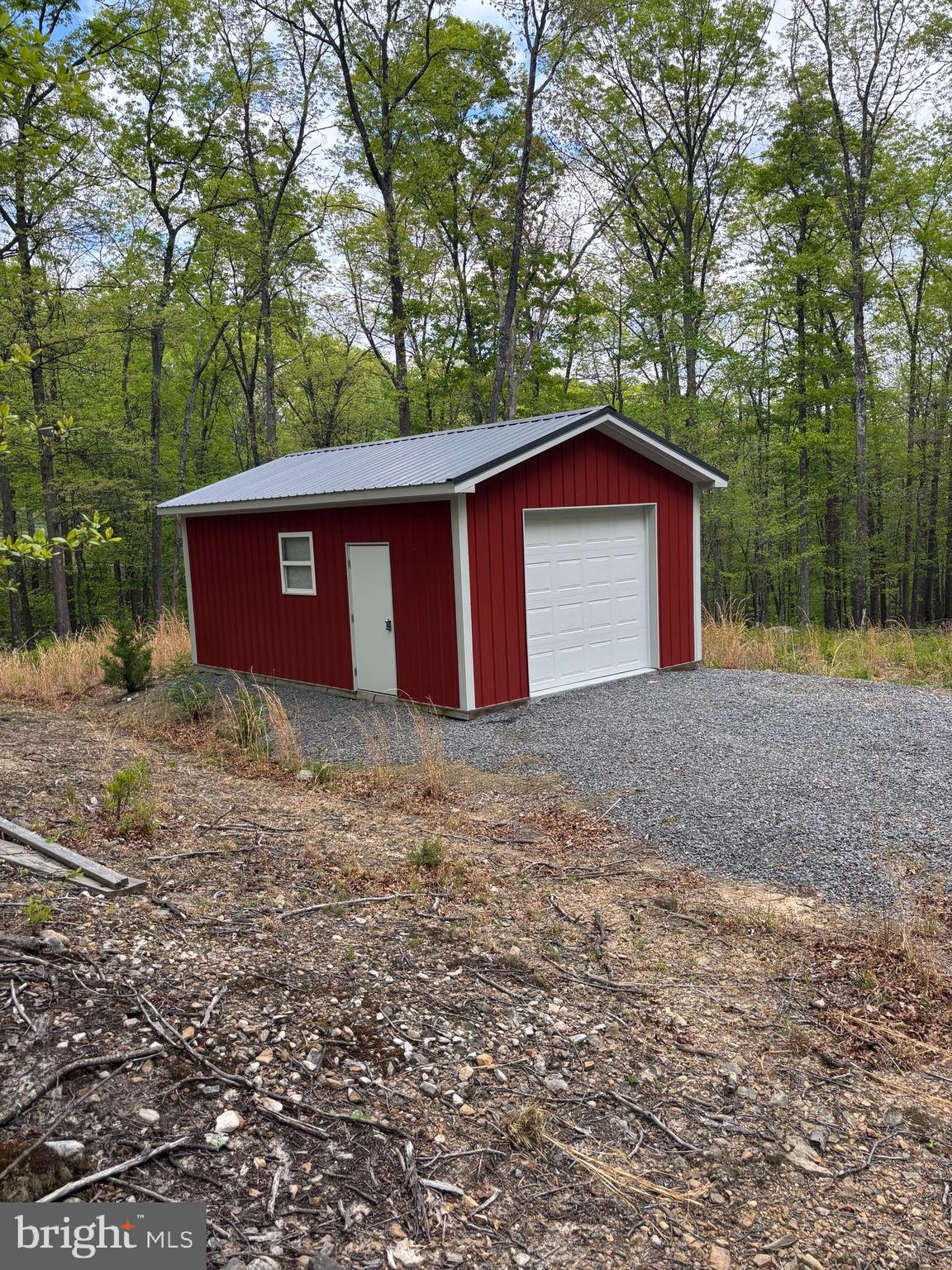 64 Trout Pass Park Road Mathias, WV 26812 - Photo 2 of 12 a front view of a house with a yard