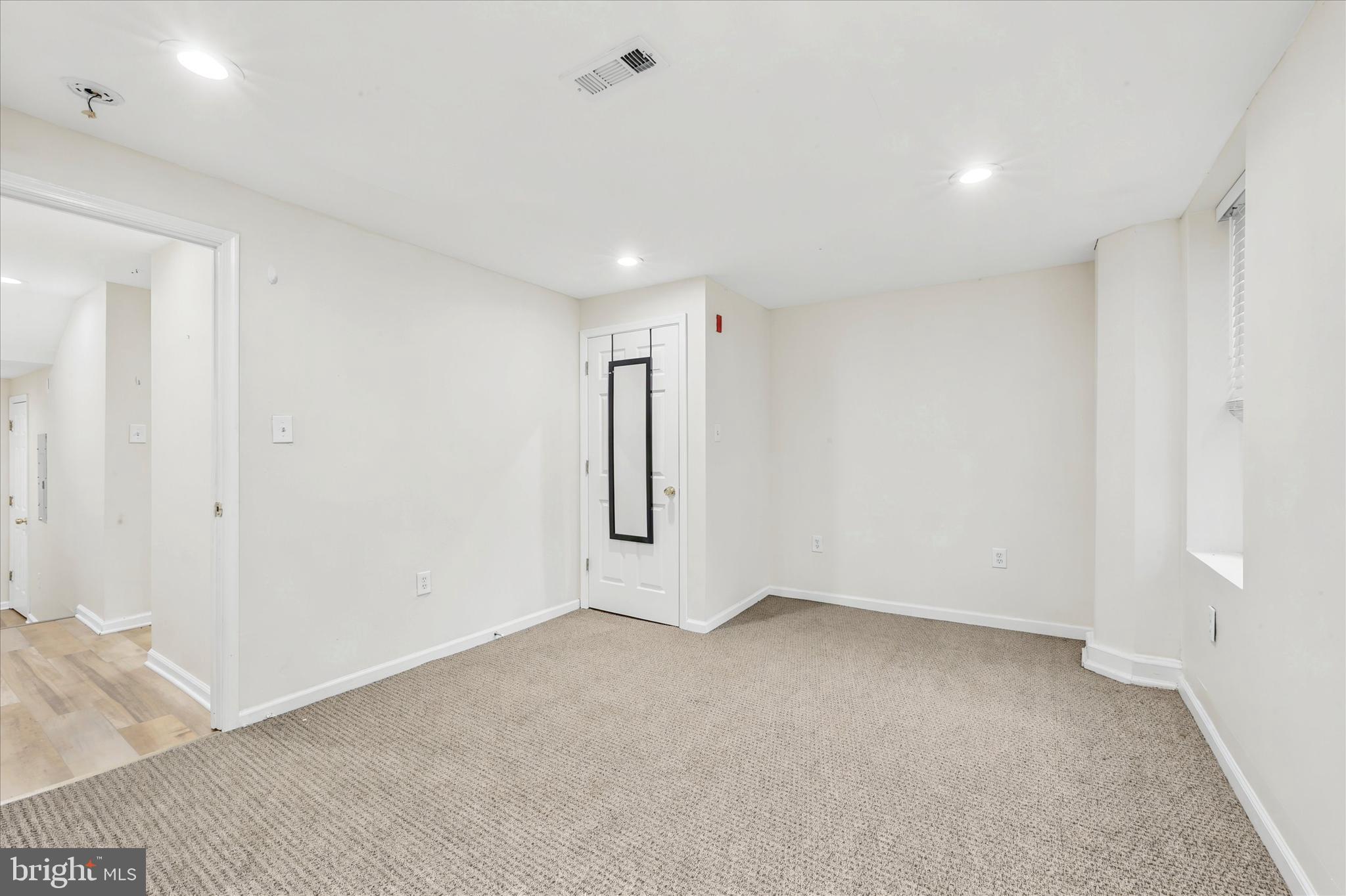 33 South 19th Street Philadelphia, PA 19103 - Photo 13 of 15 an empty room with entrance and door