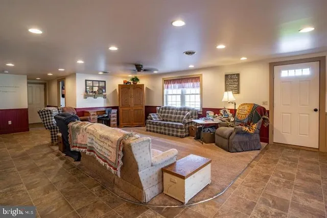 a kitchen with stainless steel appliances granite countertop wooden cabinets a sink and dishwasher