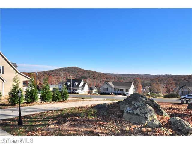 2561 Peppertree Ridge Road Randleman, NC 27317 - Photo 2 of 16 Exterior Front. Gorgeous views of the surrounding foothills. Enjoy the scenery as you relax on your rocking chair front porch.