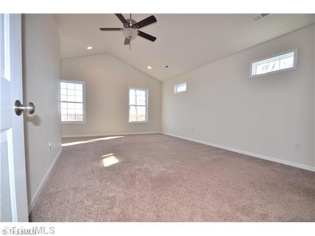 2561 Peppertree Ridge Road Randleman, NC 27317 - Photo 13 of 16 Master Bedroom. Bedrooms offer vaulted and tray ceilings.