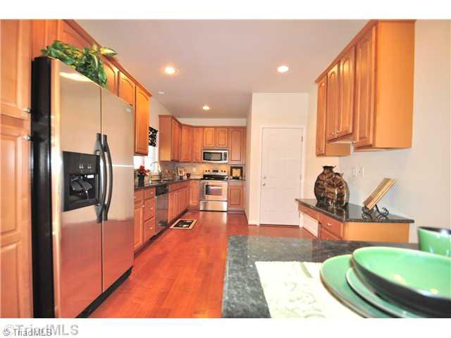2561 Peppertree Ridge Road Randleman, NC 27317 - Photo 5 of 16 Kitchen. Stainless steel appliances including refrigerator.
