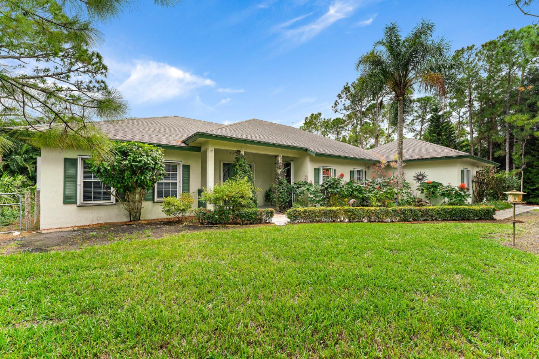 15784 Alexander Run Jupiter, FL 33478 - Photo 3 of 44 Spacious front yard