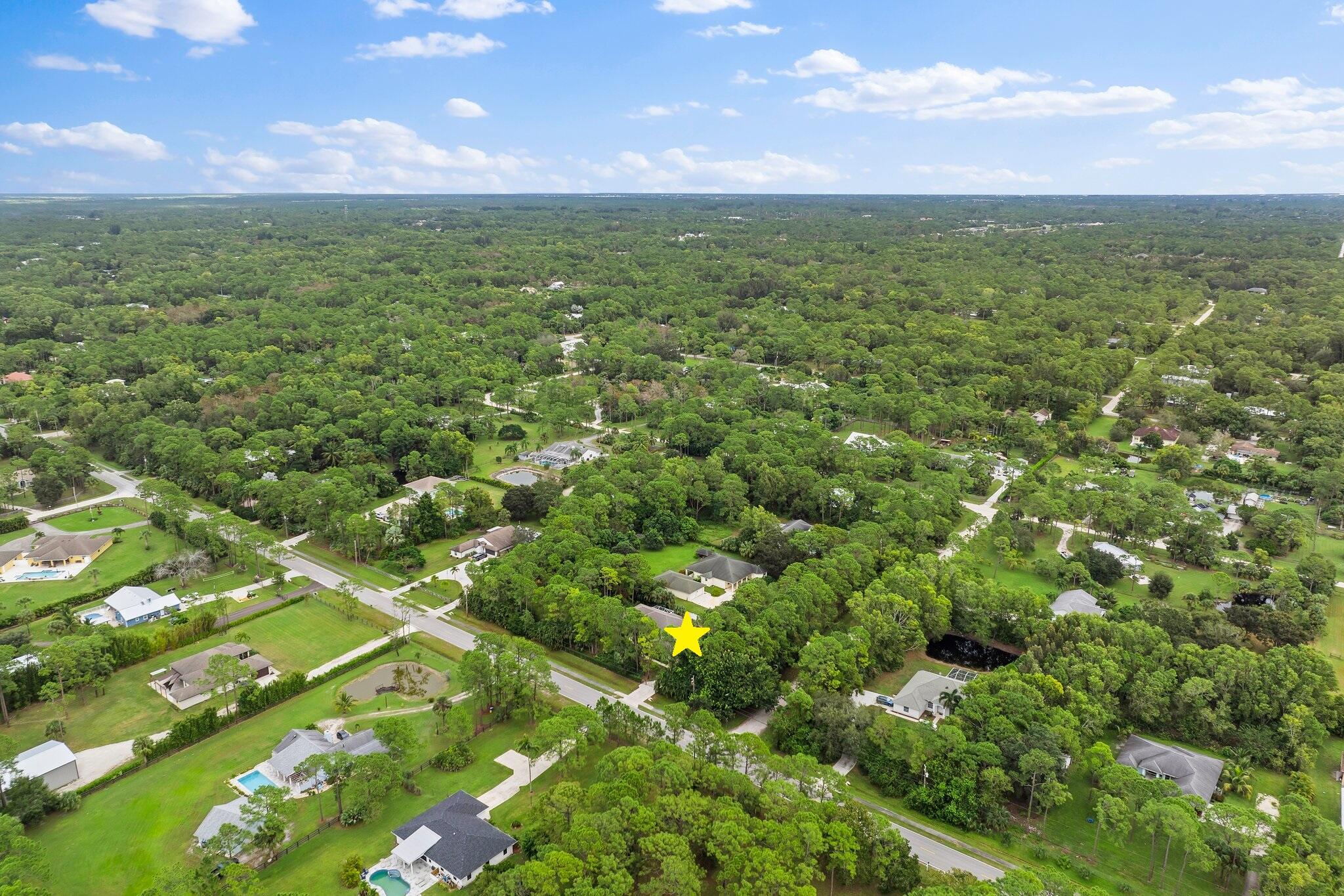 15784 Alexander Run Jupiter, FL 33478 - Photo 40 of 44 Great location on paved road