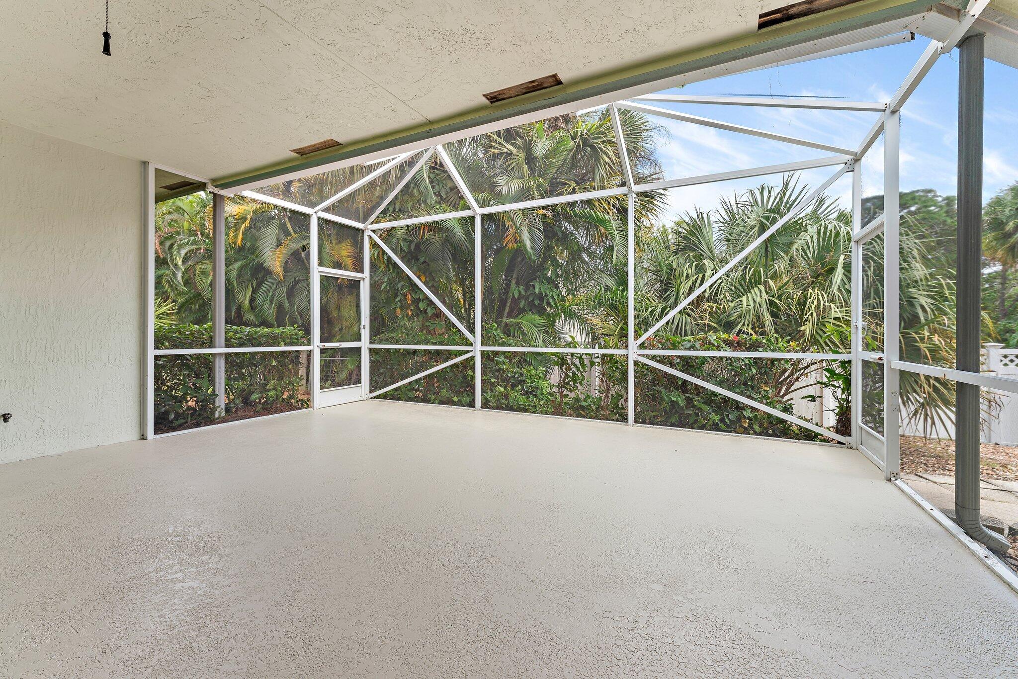 15784 Alexander Run Jupiter, FL 33478 - Photo 9 of 44 Fully screened lanai