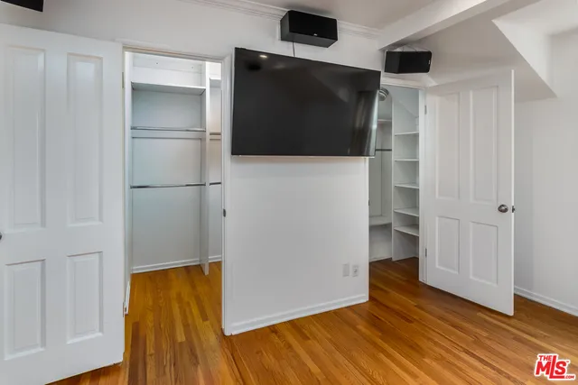 a view of a livingroom with wooden floor