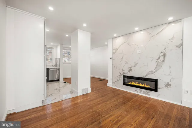 a view of a elevator with wooden floor
