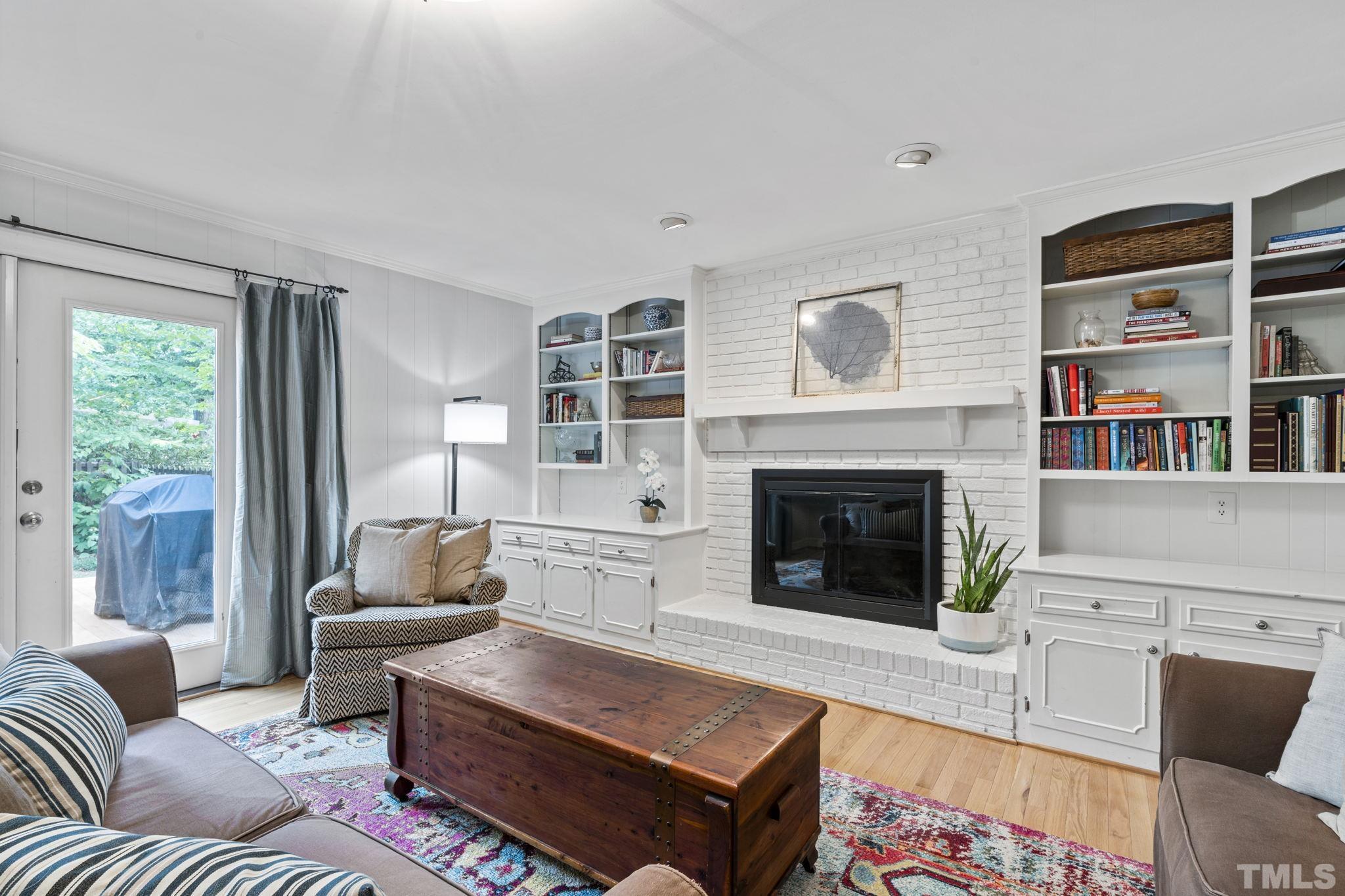 3412 Wembley Court Raleigh, NC 27607 - Photo 14 of 46 a living room with furniture fireplace and window