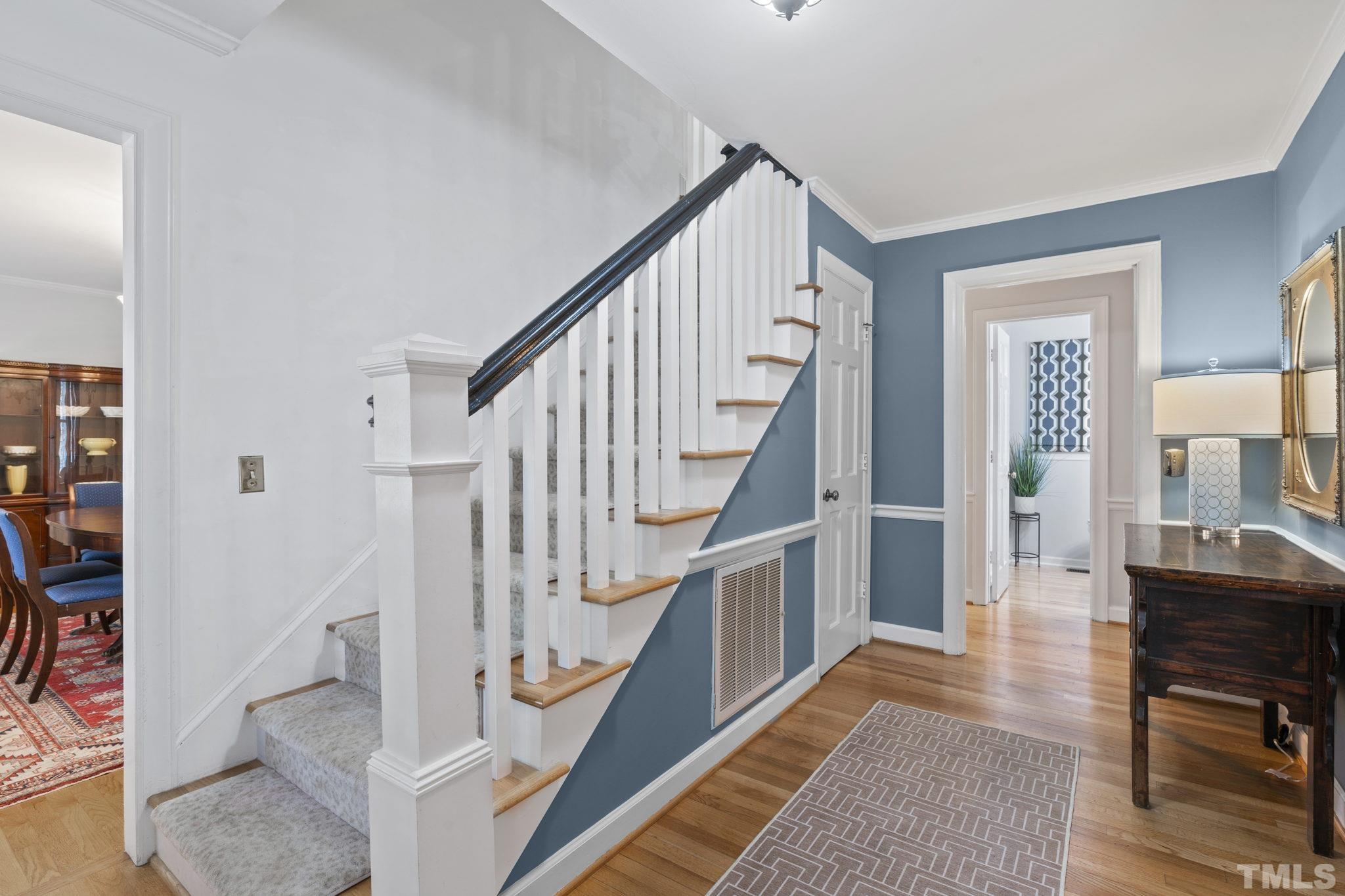 3412 Wembley Court Raleigh, NC 27607 - Photo 4 of 46 a view of entryway and hall with wooden floor