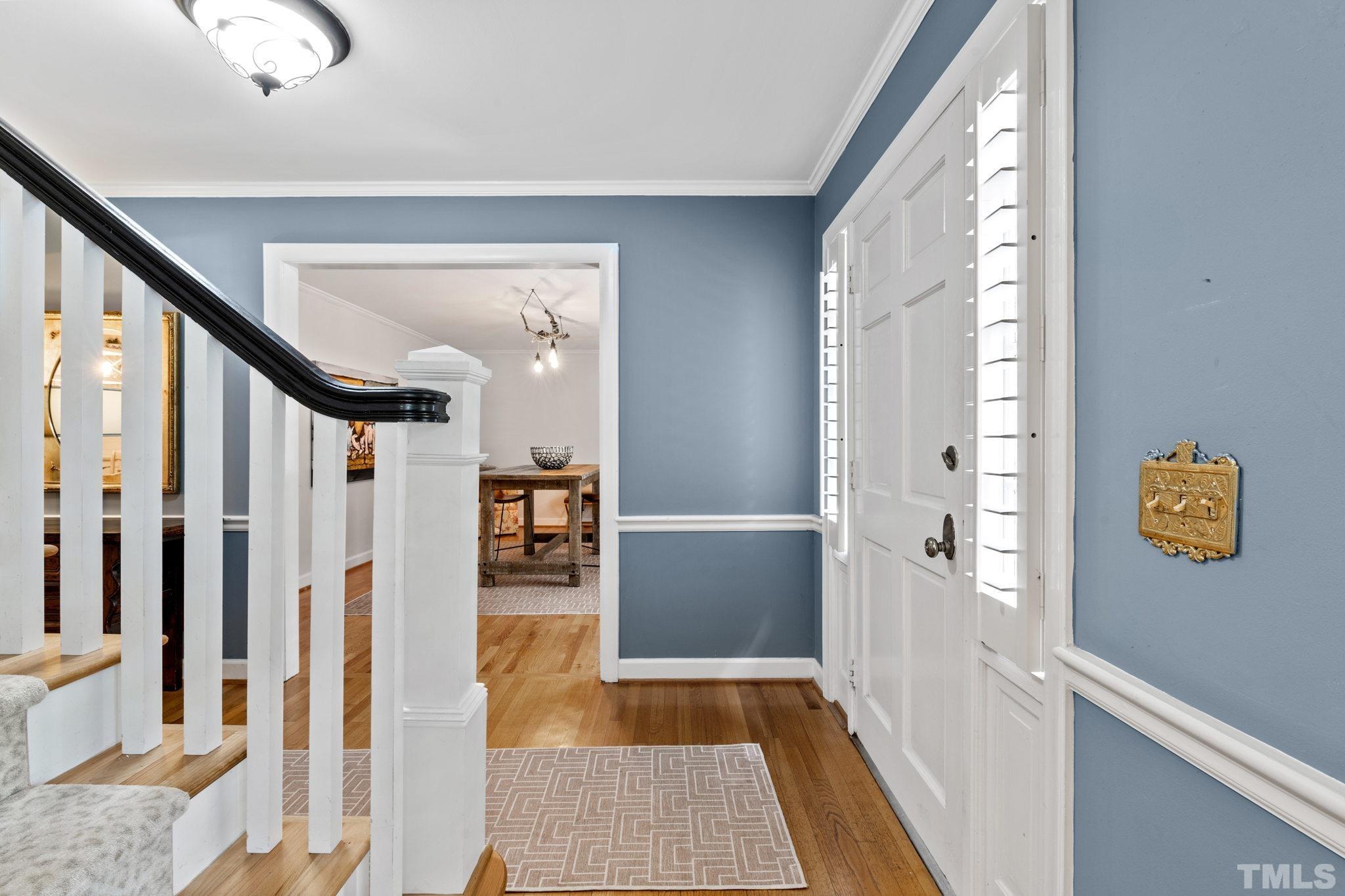 3412 Wembley Court Raleigh, NC 27607 - Photo 6 of 46 a view of an entryway with wooden floor and a rug