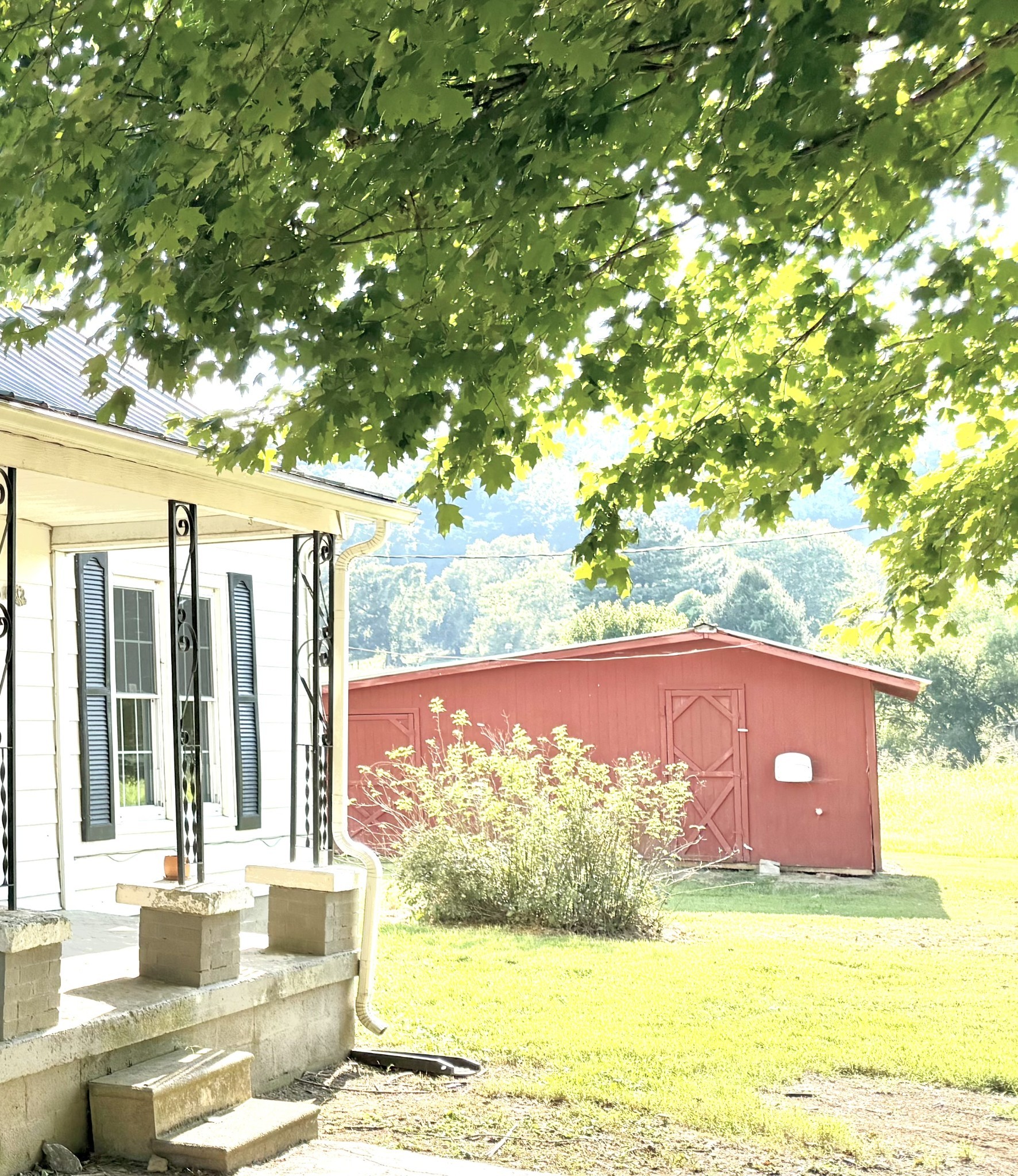 520 Pumpkin Branch Road Dixon Springs, TN 37057 - Photo 34 of 36 a view of a house with a yard