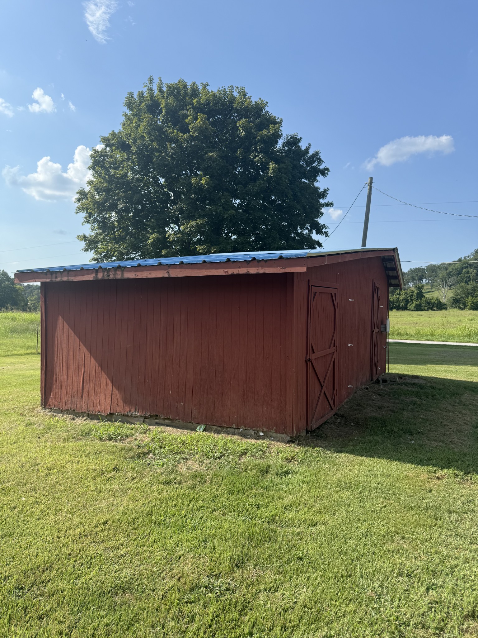 520 Pumpkin Branch Road Dixon Springs, TN 37057 - Photo 36 of 36 a view of backyard with barn