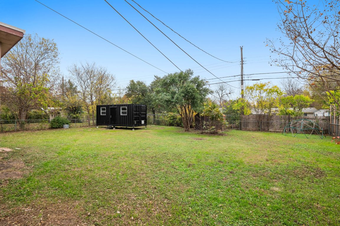 7517 Delafield Lane Austin, TX 78752 - Photo 39 of 39 Fenced backyard featuring a shed