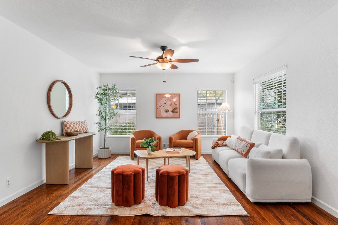 7517 Delafield Lane Austin, TX 78752 - Photo 6 of 39 Living area features original hardwood floors, updated windows and abundant natural light.