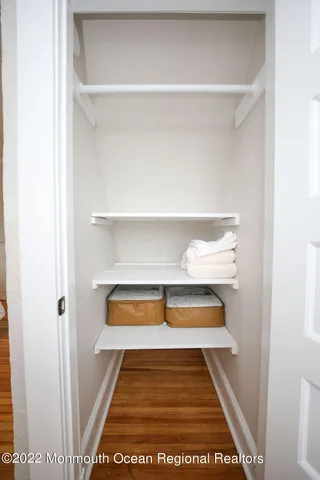 a bathroom with a toilet a sink and shower