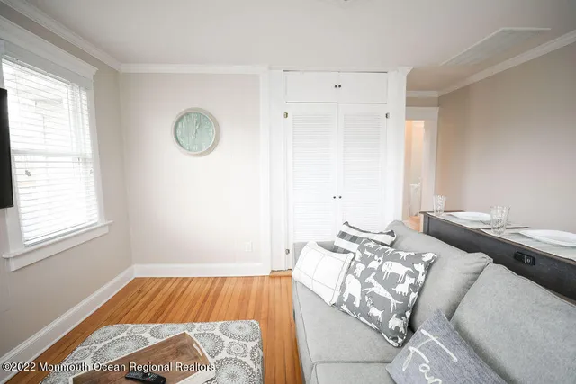 a bedroom with bed and a window