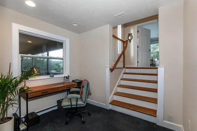 a room with furniture and a window