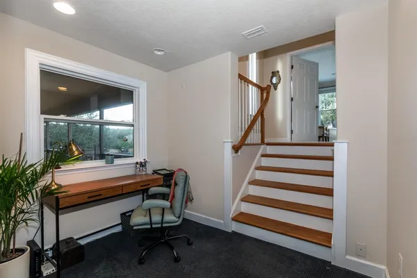 a room with furniture and a window