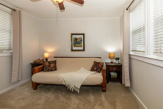 a bed room with a bed and a couch