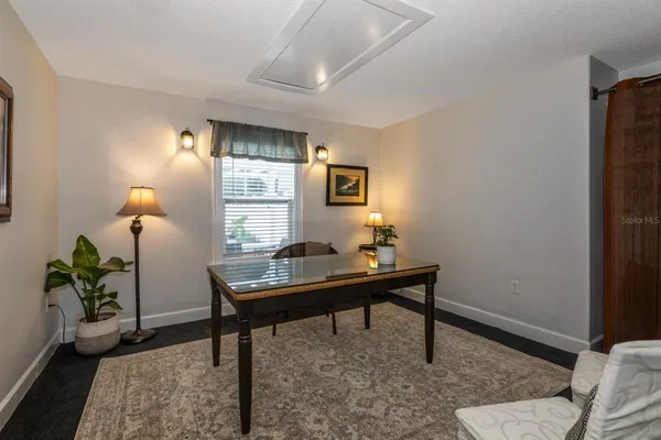 a view of a workspace with furniture