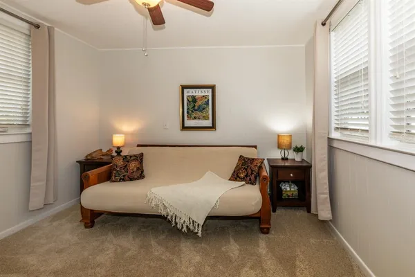 a bed room with a bed and a couch