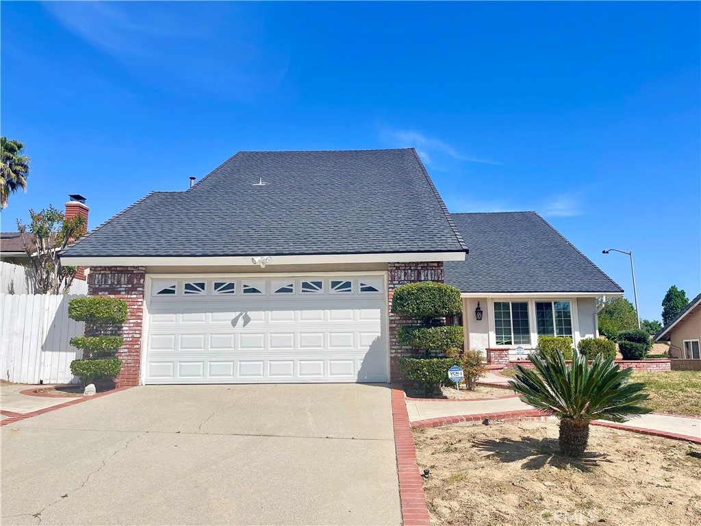 620 Lone Eagle Road Walnut, CA 91789 - Photo 1 of 1 front view of house with a yard