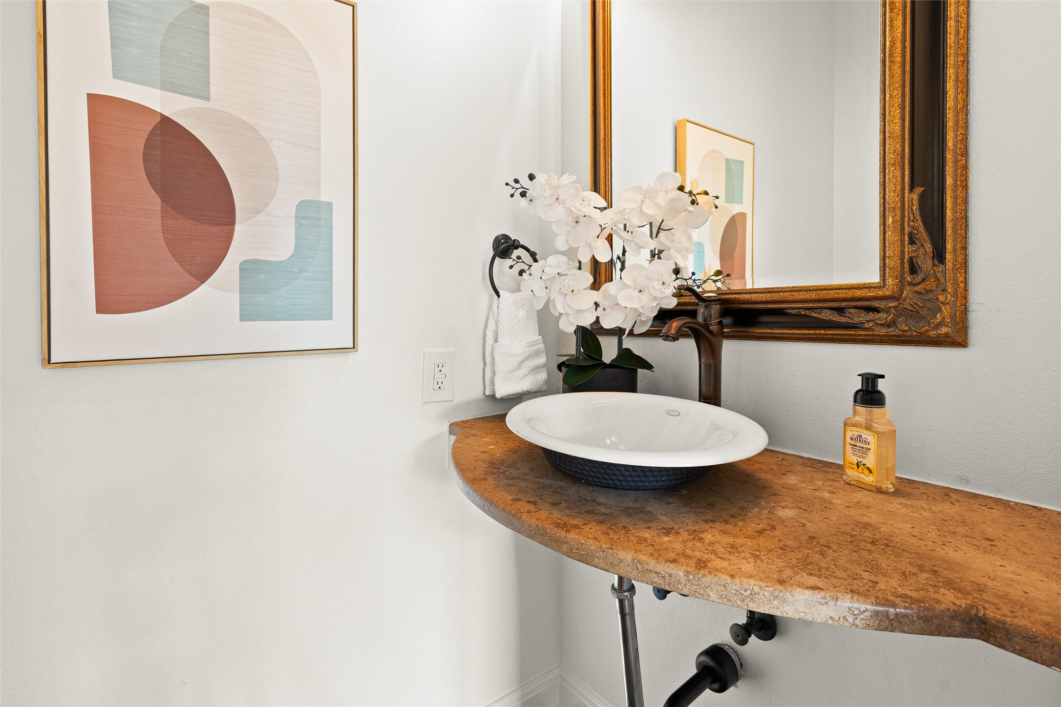 8540 Adirondack Trail, Unit 21 Austin, TX 78759 - Photo 15 of 40 a bathroom with a granite countertop sink and a mirror