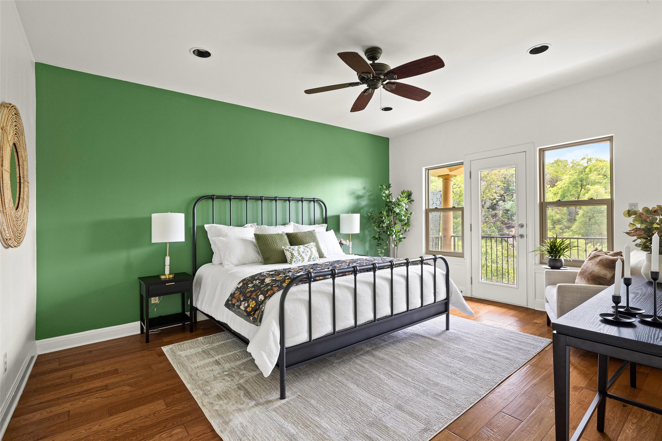 8540 Adirondack Trail, Unit 21 Austin, TX 78759 - Photo 17 of 40 a spacious bedroom with a bed and a chandelier