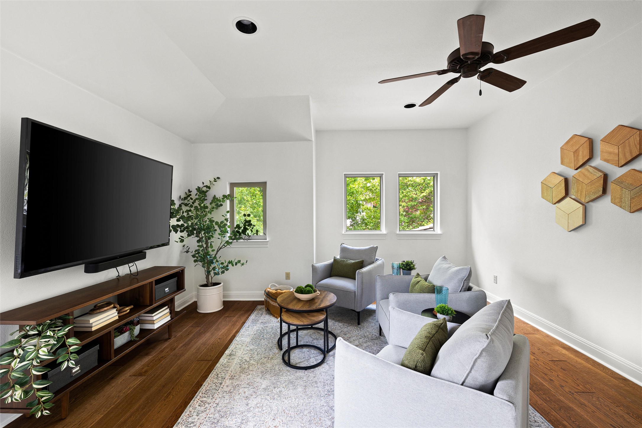 8540 Adirondack Trail, Unit 21 Austin, TX 78759 - Photo 24 of 40 a living room with furniture and a flat screen tv