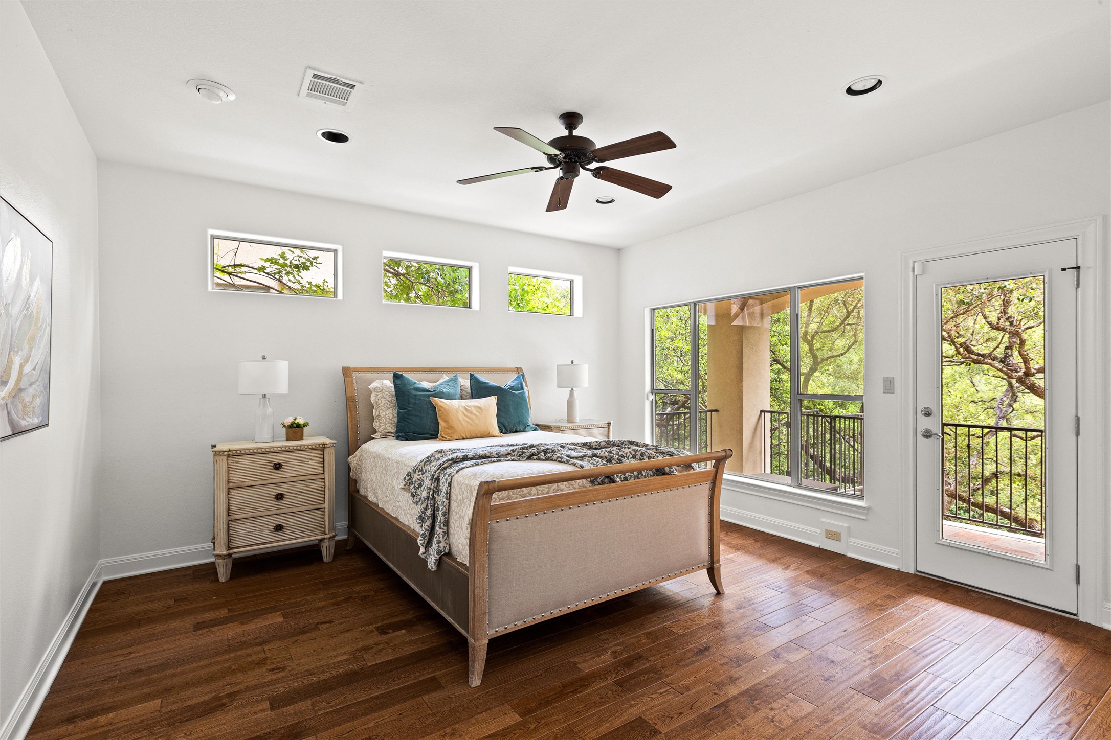 8540 Adirondack Trail, Unit 21 Austin, TX 78759 - Photo 25 of 40 a bed room with a bed and a large window