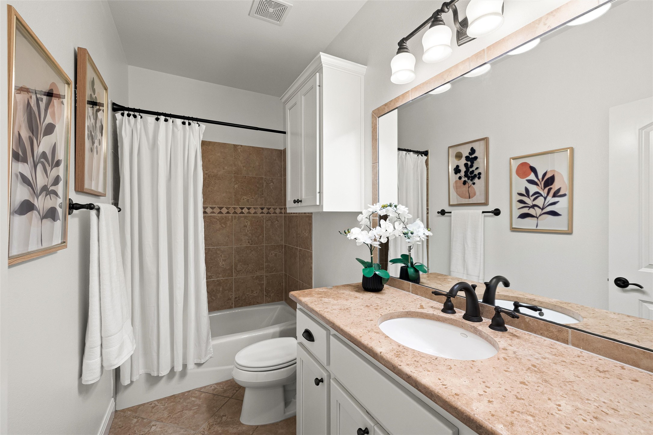 8540 Adirondack Trail, Unit 21 Austin, TX 78759 - Photo 29 of 40 a bathroom with a granite countertop sink toilet and shower