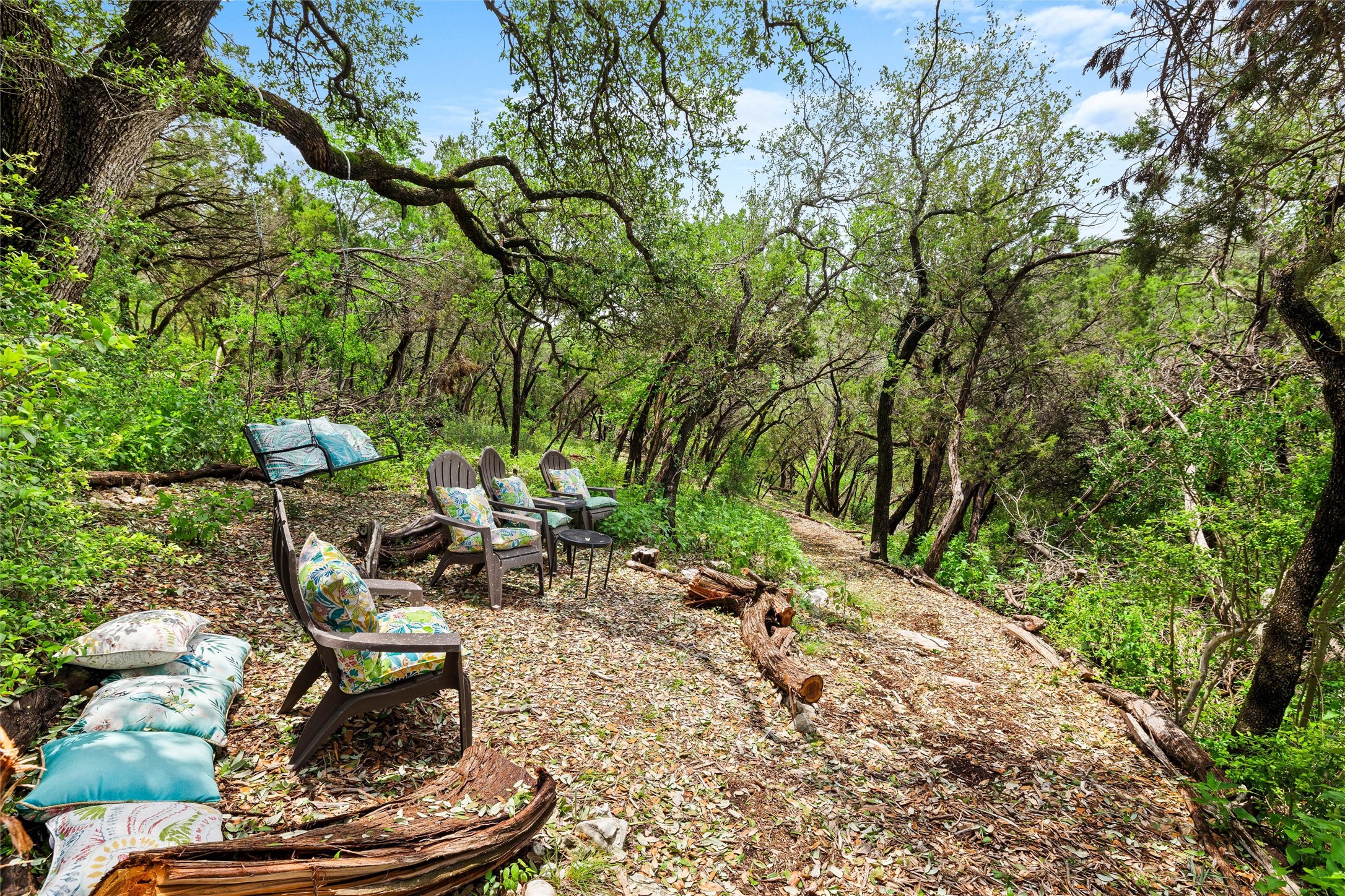 8540 Adirondack Trail, Unit 21 Austin, TX 78759 - Photo 39 of 40 a view of an outdoor sitting area with fire pit