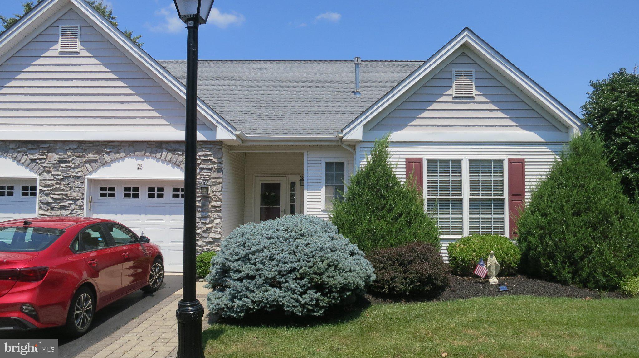 25 Chickadee Way Hamilton, NJ 08690 - Photo 1 of 26 a front view of a house with garden