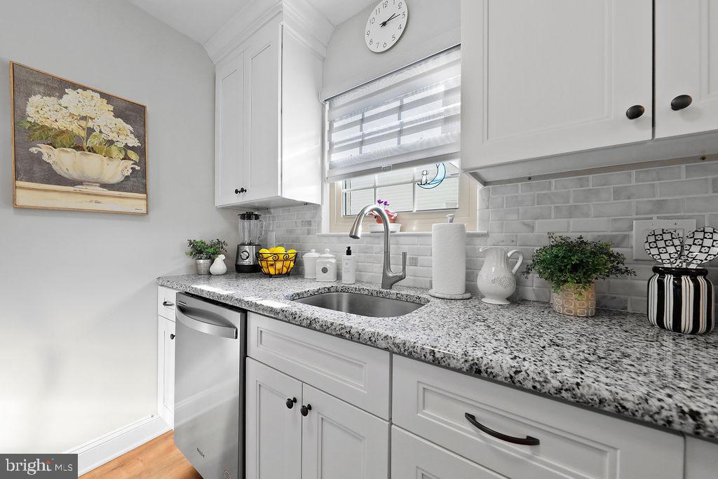 133 Tavistock Cherry Hill, NJ 08034 - Photo 4 of 35 a kitchen with sink and window