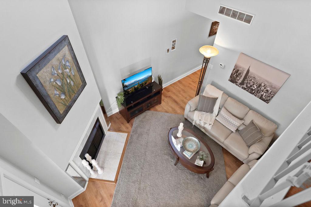 133 Tavistock Cherry Hill, NJ 08034 - Photo 7 of 35 a living room with furniture and a flat screen tv