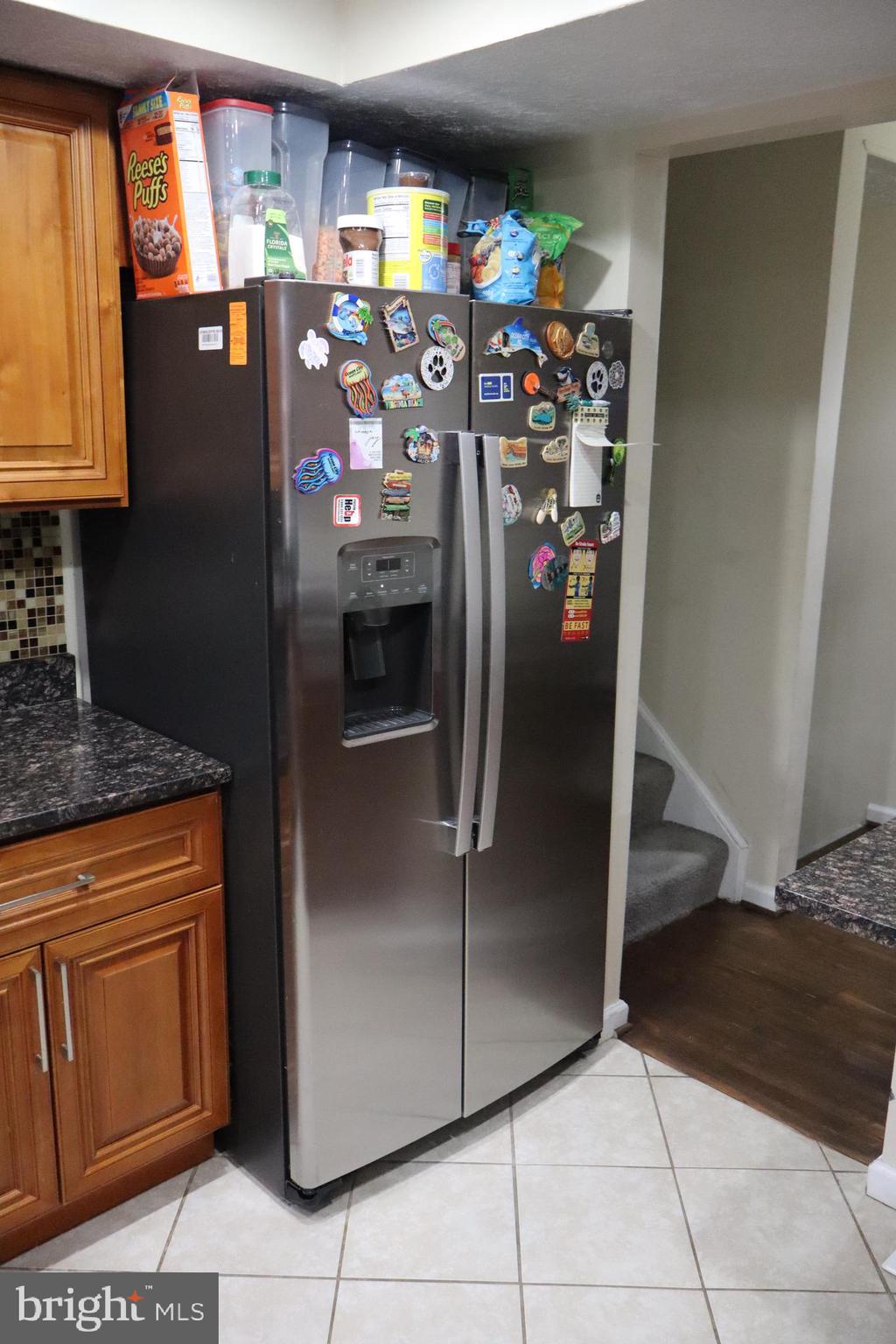 10916 Bridle Path Circle Waldorf, MD 20601 - Photo 25 of 31 a kitchen with stainless steel appliances granite countertop a refrigerator and a sink