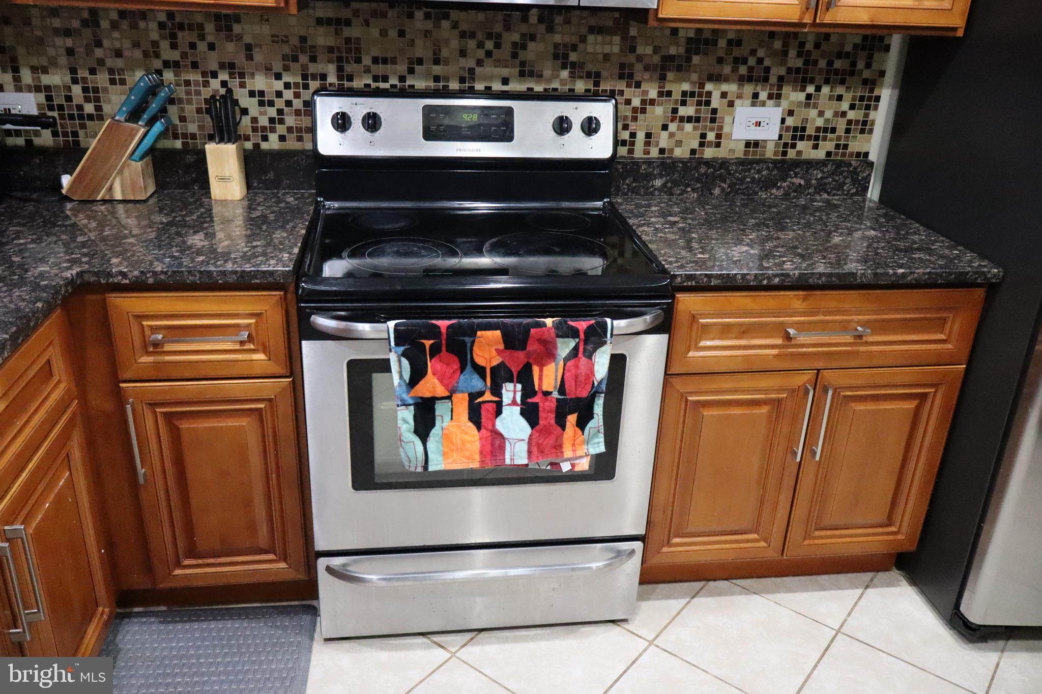 10916 Bridle Path Circle Waldorf, MD 20601 - Photo 8 of 36 a stove top oven sitting inside of a kitchen