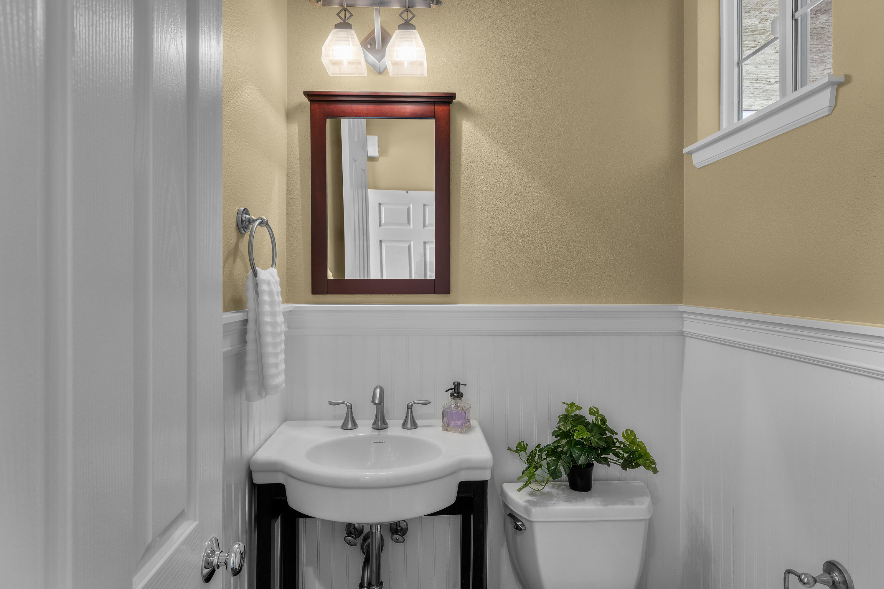 19307 Blue Lake Loop Bend, OR 97702 - Photo 18 of 58 a bathroom with a sink toilet and a mirror