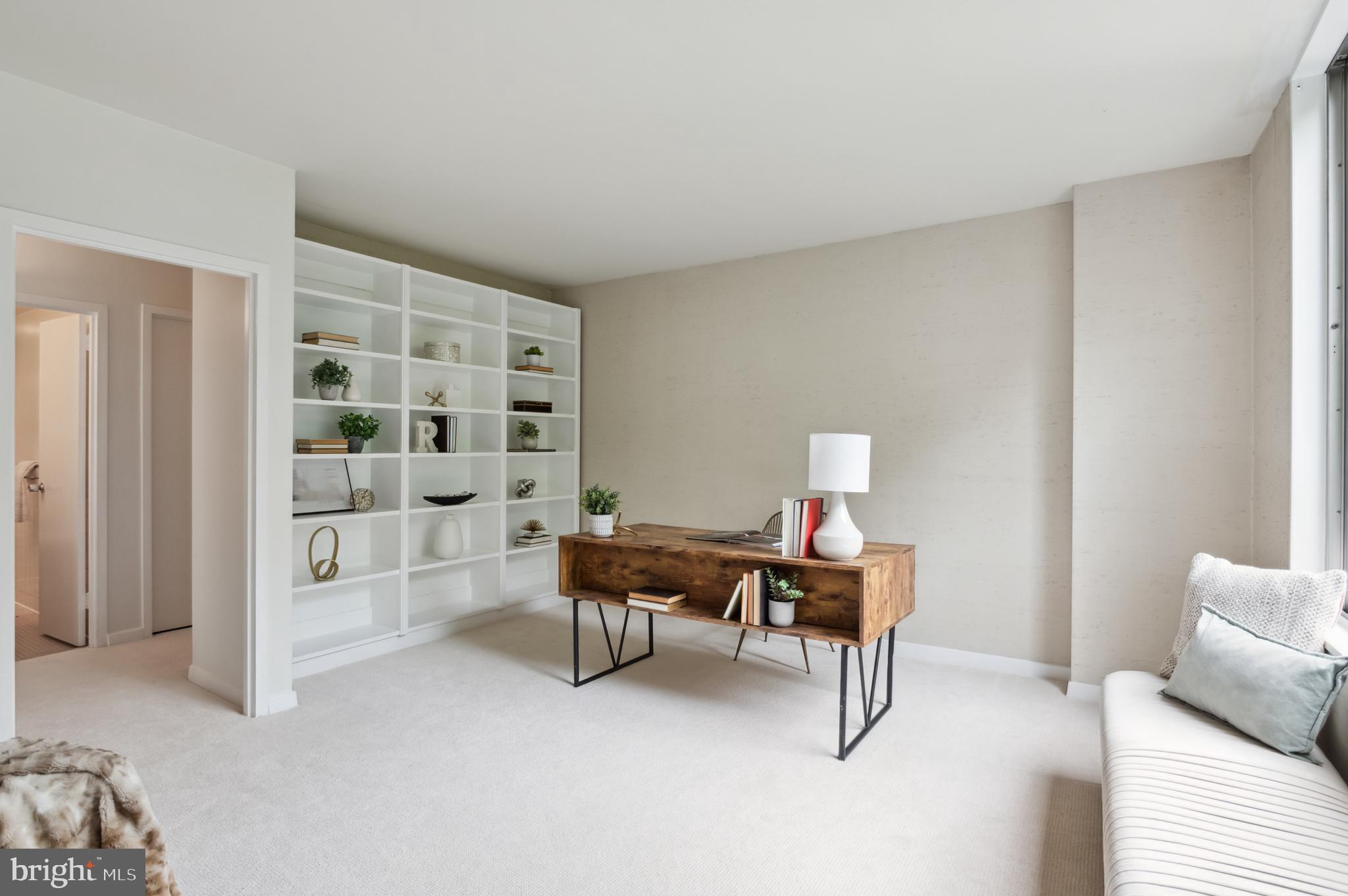 4100 Cathedral Avenue Northwest, Unit 709 Washington, DC 20016 - Photo 11 of 20 a living room with furniture