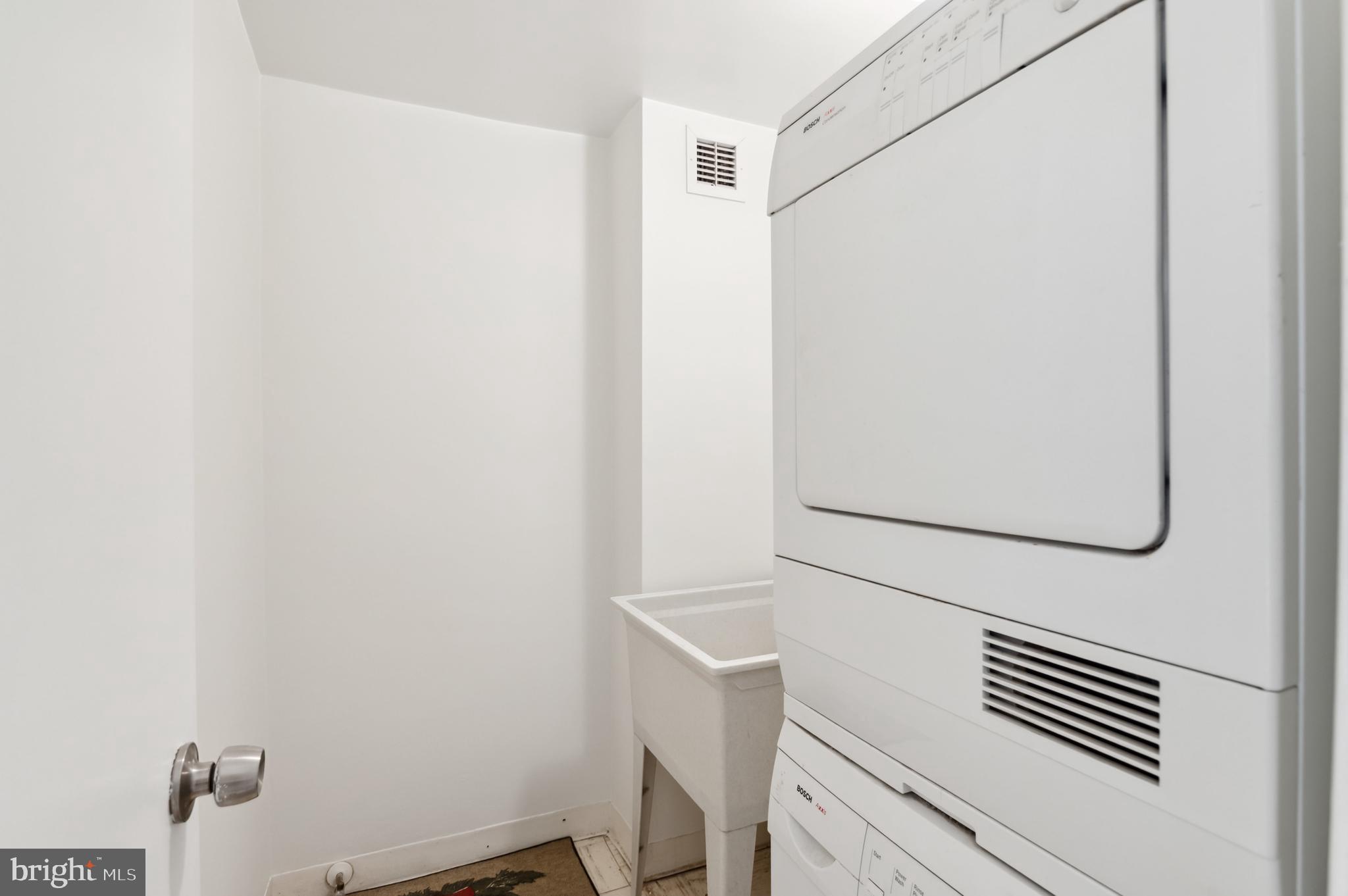 4100 Cathedral Avenue Northwest, Unit 709 Washington, DC 20016 - Photo 13 of 20 a view of washer and dryer