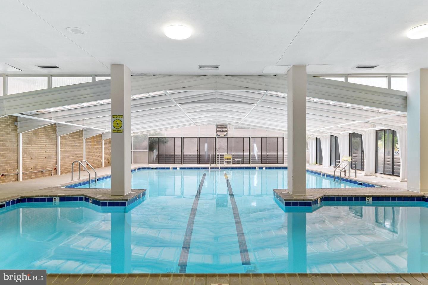 4100 Cathedral Avenue Northwest, Unit 709 Washington, DC 20016 - Photo 17 of 20 a view of a living room and kitchen area