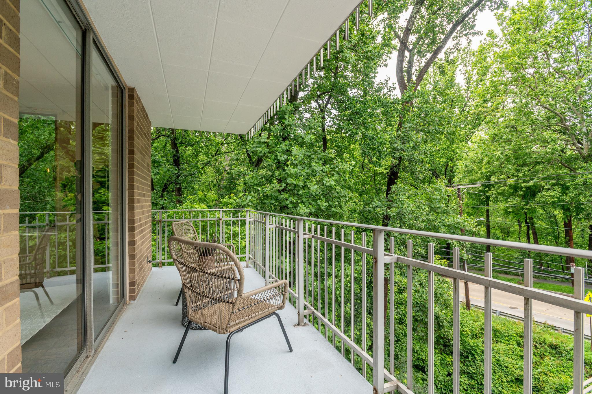 4100 Cathedral Avenue Northwest, Unit 709 Washington, DC 20016 - Photo 4 of 20 a view of a chair in a balcony