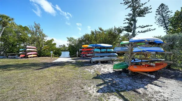a childrens park with lots of swings and slides