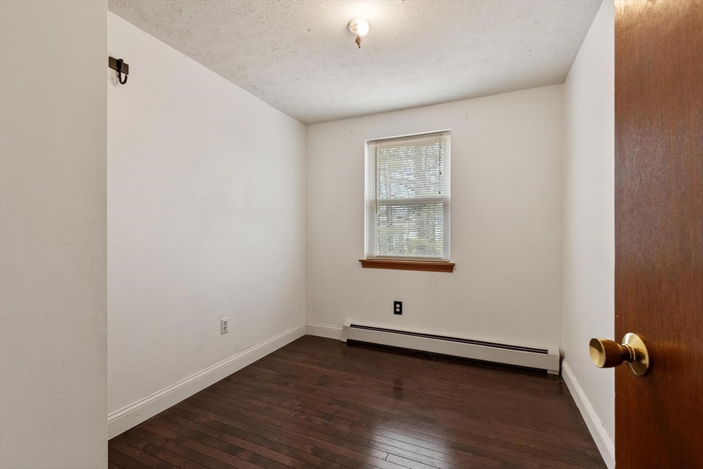 681 Teel Road Winchendon, MA 01475 - Photo 11 of 27 a view of a room with wooden floor and window