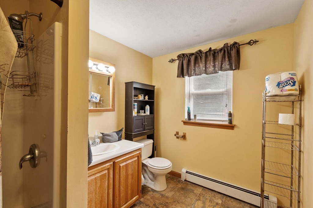 681 Teel Road Winchendon, MA 01475 - Photo 21 of 27 a bathroom with a toilet a sink and shower