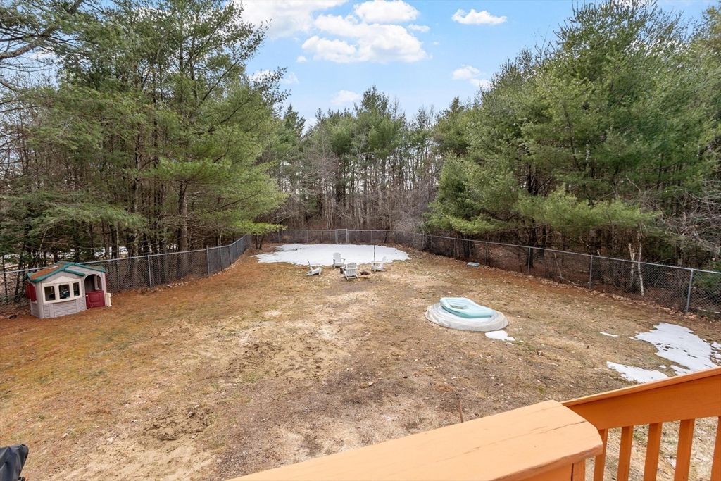 681 Teel Road Winchendon, MA 01475 - Photo 23 of 27 a view of a backyard with wooden fence